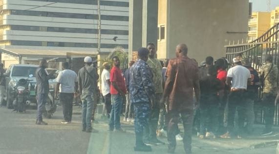 Suspected NDC supporters gather at GRA to deny acting Boss entry